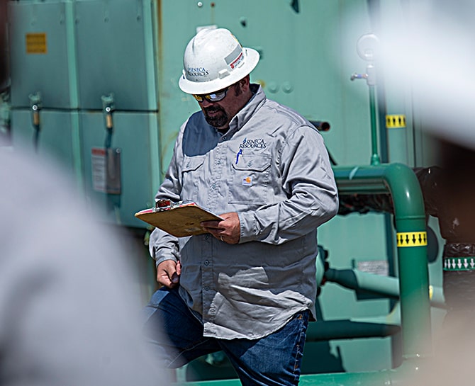 worker reviewing plans