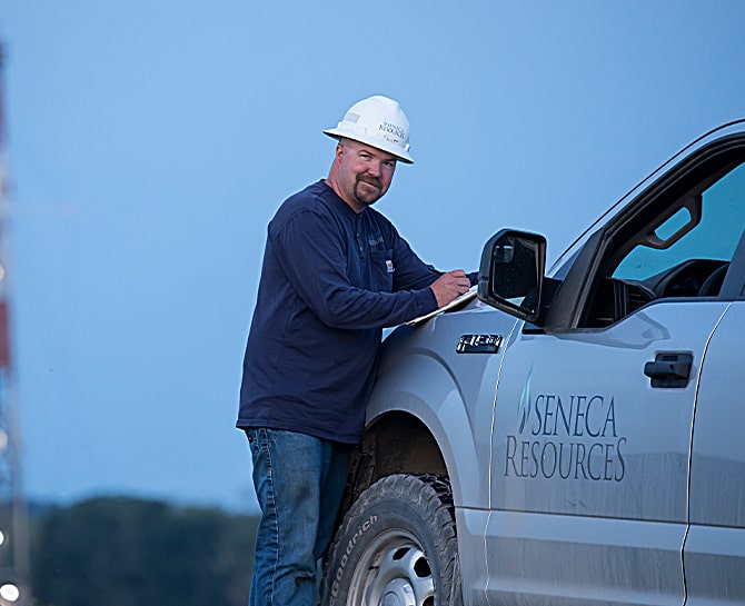 worker in hard hat smiling