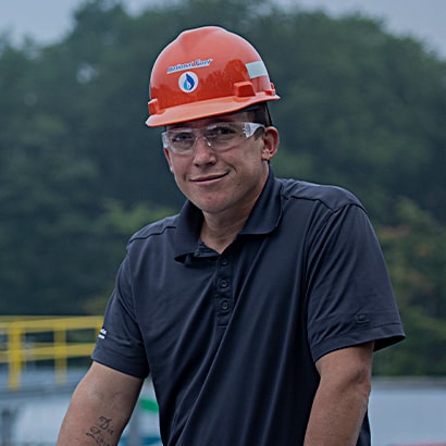 smiling worker in hard hat