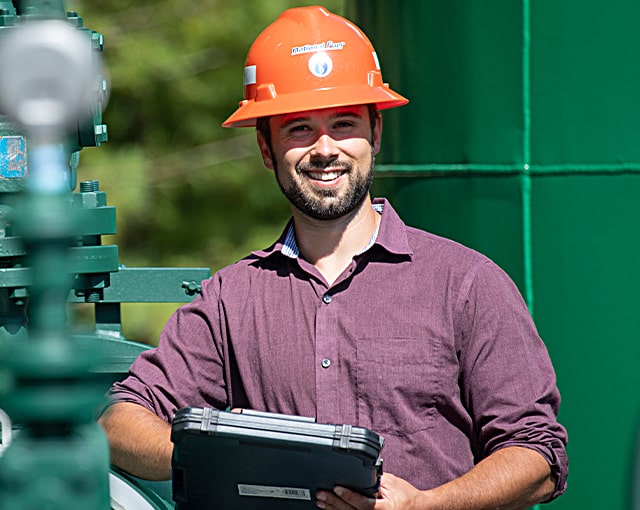 smiling worker in hard hat