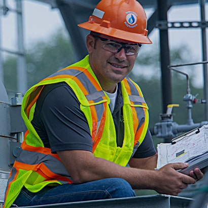 smiling worker in hard hat