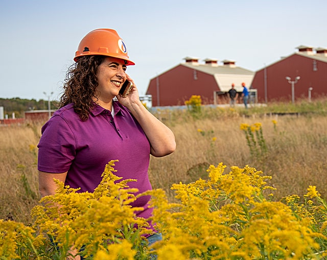 worker on phone in field