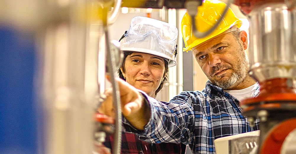 Man and woman working on-site