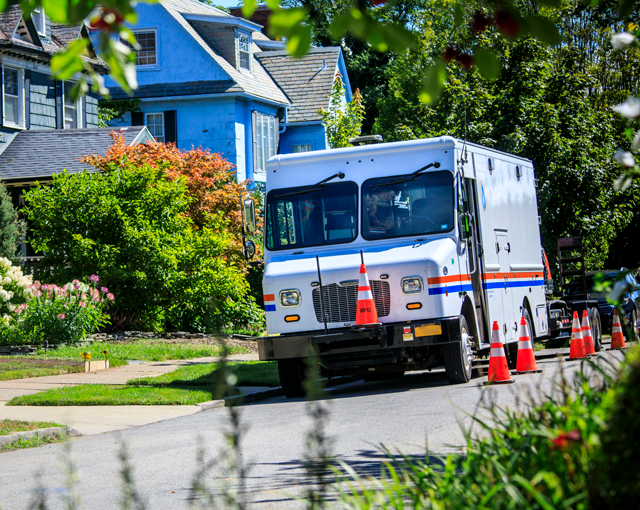 utility truck parked on a street